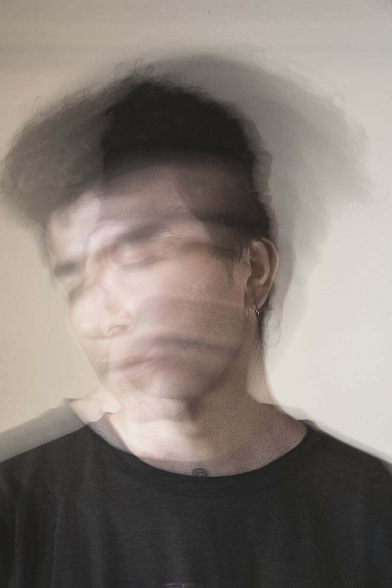 Blurry Portrait of a Man in Black